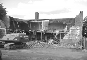 The dilapidated auto-parts store that formerly occupied 120 Goffe Street is torn down to make way for a new apartment complex for low-income seniors. The building project, initiated by St. Luke’s Episcopal Church, was furthered by the efforts of a dedicated group of students from the Yale Law School.